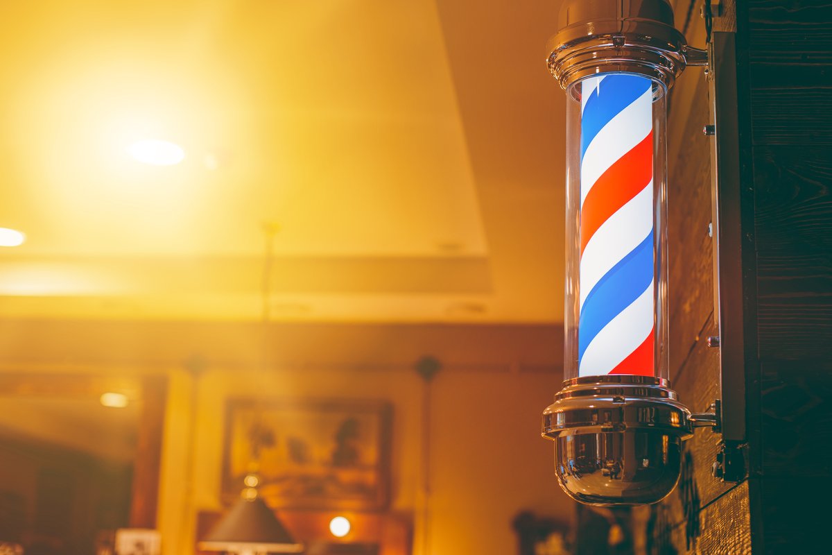 barbershop interior with traditional barber pole