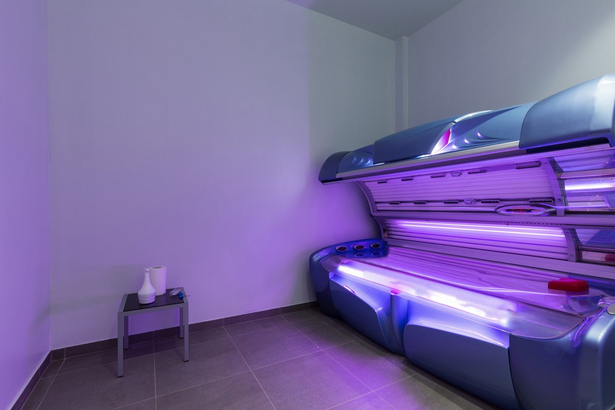 tanning bed session in a studio